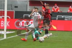 3. Fußball-Liga - Saison 2020/2021 - FC Ingolstadt 04 - FC Viktoria Köln - Filip Bilbija (#35,FCI)  - Dennis Eckert Ayensa (#7,FCI)  - Sebastian Mielitz Torwart (#1 Köln) - Foto: Meyer Jürgen