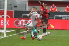 3. Fußball-Liga - Saison 2020/2021 - FC Ingolstadt 04 - FC Viktoria Köln - Filip Bilbija (#35,FCI)  - Dennis Eckert Ayensa (#7,FCI)  - Sebastian Mielitz Torwart (#1 Köln) - Foto: Meyer Jürgen