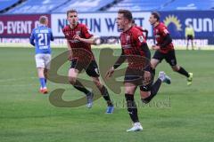 3. Liga - Hansa Rostock - FC Ingolstadt 04 - Tor Jubel 0:1 Dennis Eckert Ayensa (7, FCI) mit Filip Bilbija (35, FCI)