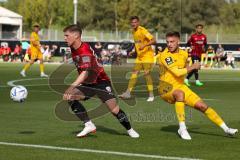 Freundschaftsspiel - Saison 2022/2023 - FC Ingolstadt 04 -  SpVgg Bayreuth - Denis Linsenmayer (Nr.23 - FCI) - Tim Latteier (Nr.22 - SpVgg Bayreuth) - Foto: Meyer Jürgen