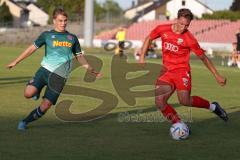 Bayernliga Nord - Saison 2023/2024 - FC Ingolstadt 04 - SSV Jahn Regensburg - Moritz Wiezorrek (Nr.15 - FCI U21) - Luis Bezjak grün Regensburg - Foto: Meyer Jürgen