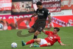 3.Liga - Saison 2022/2023 - Hallersche FC - FC Ingolstadt 04 -  Justin Butler (Nr.31 - FCI) - Lucas Halangk (Nr.16 - Halle) - - Foto: Meyer Jürgen