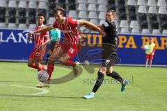 3.Liga - Saison 2022/2023 - SC Freiburg II - FC Ingolstadt 04 - Pascal Testroet (Nr.37 - FCI) - Max Rosenfelder (Nr.16 - SC Freiburg II) -  - Foto: Meyer Jürgen