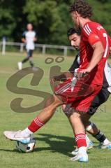 Testspiel - Bezirksliga - Saison 2025/26 - TSV Ober./Unterhaunstadt - Türkisch Ingolstadt  - Enis Kuqanaj rot Türkisch  - Firat Acar weiss Ober./Unterh.stadt - Foto: Meyer Jürgen