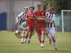 Bayernliga Nord - Saison 2026/27 - FC Ingolstadt 04 II - Jahn Regensburg II - Fabio Riedl (Nr.24 - FCI II) - Raphael Steudtner rot Regensburg - Foto: Meyer Jürgen