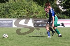 Kreisklasse - Saison 2025/26- SV Haunwöhr - FC Geisenfeld  - Tim Schirmer blau Haunwöhr - Lukas Kellermann grün Geisenfeld - Foto: Meyer Jürgen