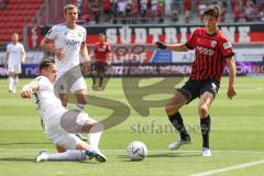 3.Liga - Saison 2022/2023 - FC Ingolstadt 04 -  1. FC Saarbrücken - Röhl Merlin (Nr.34 - FCI) - Bjarne Thoelke (Nr.16 - 1. FC Saarbrücken) - Foto: Meyer Jürgen