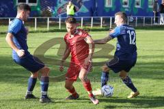 Kreisliga - Saison 2022/2023 - Türk.SV Ingolstadt - SV Menning - Oliver Ölz blau Menning rechts - Aytac Mandaci rot Türk SV -  Foto: Meyer Jürgen