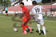 Bayernliga Süd - Saison 2022/2023 - FC Ingolstadt 04 -  TSV Dachau - Udogu David (Nr.2 - Fc Ingolstadt 04 II) - Kelmendi Lirim weiss Dachau - Foto: Meyer Jürgen