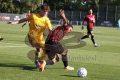 Freundschaftsspiel - Saison 2022/2023 - FC Ingolstadt 04 -  SpVgg Bayreuth - Justin Butler (Nr.31 - FCI) - Patrick Scheder (Nr.26 - SpVgg Bayreuth) - Foto: Meyer Jürgen