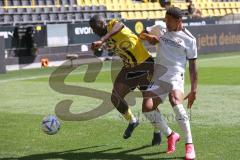 3. Fußball-Liga - Saison 2022/2023 - Borussia Dortmund II - FC Ingolstadt 04 - Soumaila Coulibaly (Nr.44 - Borussia Dortmund II) - Justin Butler (Nr.31 - FCI) - Foto: Meyer Jürgen