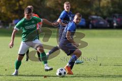 2023_10_28 - Kreisliga - Saison 2023/24 - SV Menning - FC Gerolfing  - Raymong Kreizer grün Gerolfing - Mathias Hamm blau Menning - Foto: Meyer Jürgen