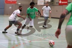 Hallenturnier Ingolstadt Nord - Saison 2024/25 - MBB SG MAnching - FC Fatih Ingolstadt  - Faniel Brhane grün Fatih  - Batuhan Pehlül weisss Manching - Foto: Meyer Jürgen