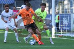 3.Liga - Saison 2023/2024 - SC Freiburg II - FC Ingolstadt 04 -Jannik Mause (Nr.7 - FCI) mit einer Torchance -  Franci Bouebari (Nr.19 - Freiburg II) - Torwart Jaaso Jantunen (Nr.31 - Freiburg II) - Foto: Meyer Jürgen