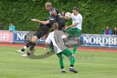 Kreisliga - FC Fatih Ingolstadt - FC Gerolfing - Emre Erdogan #5 schwarz Fatih - Mathias Habricht schwarz Fatih #9 - Niklas Nissl weiss #11 Gerolfing - Foto: Jürgen Meyer