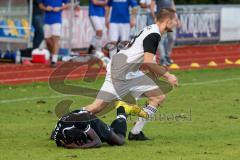 Bezirksliga - Saison 2022/2023 - FC Fatih Ingolstadt - TSV Rohrbach - Marius Fiederer weiss Rohrbach trifft mit dem Fuss den Kopf von Boubacarr Saho schwarz Fatih Ingolstadt - Foto: Meyer Jürgen