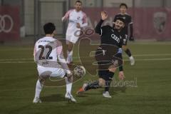 Freundschaftsspiel - Bayernliga Süd - Saison 2022/2023 - FC Ingolstadt 04 - ATSV Erlangen   - Ishak Karaogul (Nr.10 - FCI II) - Sarac Tugkan weiss Erlangen - Foto: Meyer Jürgen