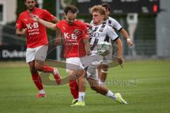 Bayernliga Nord - Saison 2026/27 - FC Ingolstadt 04 II - ASV Cham - Manuel Distl (Nr.9 - FCI II) - Simon Haimerl rot Cham - Foto: Meyer Jürgen