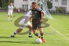 Kreisliga - Saison 2022/2023 - TSV Großmehring - Türk SV Ingolstadt - Ibrahim Sahin schwarz Türk SV Ing. - Michael Kaps weiss Großmehring -  - Foto: Meyer Jürgen