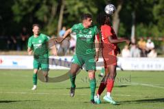 Freundschaftsspiel - Saison 2023/2024 - SV Manching - FC Ingolstadt 04 - Michael Udebuluzor (Nr.24 - FCI U21) - Daniel Spieß (Nr.22 - SV Manching) -  - Foto: Meyer Jürgen