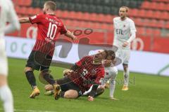 3. Fußball-Liga - Saison 2020/2021 - FC Ingolstadt 04 - FC Viktoria Köln - Tobias Schröck (#21,FCI)  wird gefoult - Foto: Meyer Jürgen