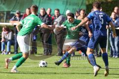 2023_10_28 - Kreisliga - Saison 2023/24 - SV Menning - FC Gerolfing  - Ananstasios Porfyriadis grün Gerolfing - Hermann Zagler blau Menning - Foto: Meyer Jürgen