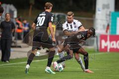 3. Liga - Saison 2026/27 - Victoria Köln - FC Ingolstadt 04  - Yannick Deichmann (Nr.20 - FCI) - Tonyw Yannick Aime (Nr.7 - Viktoria Köln) - Foto: Meyer Jürgen