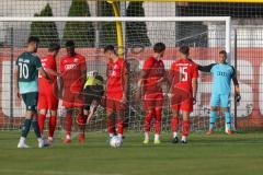 Bayernliga Nord - Saison 2023/2024 - FC Ingolstadt 04 - SSV Jahn Regensburg - Enrique Bösl Torwart FCI dirigiert dieMauer beim Feistoss - Foto: Meyer Jürgen