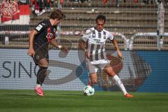 3. Liga - Saison 2026/27 - Victoria Köln - FC Ingolstadt 04  - Nishan Velupillay (Nr.28 - FCI) - Tobias Eisenhut (Nr.6 - Viktoria Köln) - Foto: Meyer Jürgen