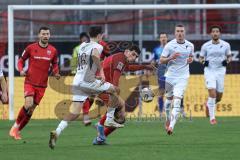 3. Liga; FC Ingolstadt 04 - TSG Hoffenheim II; Zweikampf Kampf um den Ball Ognjen Drakulic (30, FCI) Hör Yannis (16 TSG) Lukas Fröde (34, FCI) Gendrey Valentin (2 TSG)
