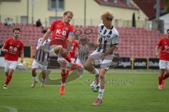 Bayernliga Nord - Saison 2026/27 - FC Ingolstadt 04 II - ASV Cham - Patrick Bachmann (Nr.11 - FCI II) - Felix Voigt rot Cham - Foto: Meyer Jürgen
