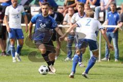 Kreisliga - Saison 2023/2024 - SV Menning - FC Mindelstetten - Johannes Boyer blau Menning - Jonas Schoberer weiss Mindelstetten - Foto: Meyer Jürgen