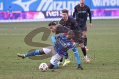 3. Liga - Saison 2025/26 - Hansa Rostock - FC Ingolstadt 04  - Emilio Kehrer (Nr.44 - FCI) - Christian Kinsombi (Nr.27 - Hansa Rostock)  - Foto: Meyer Jürgen