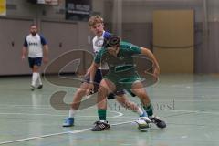 Hallenturnier Ingolstadt Nord - Saison 2024/25 - FC Geisenfeld - TSV Etting - Furkan Bayraktar grün Geisenfeld - Juri Braun weisss Etting - Foto: Meyer Jürgen