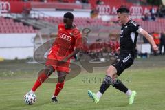 Bayernliga Süd - Saison 2022/2023 - FC Ingolstadt 04 - FC Memmingen - Ibrahim Madougou (Nr.9 - FCI II) - Jakob Gräser schwarz Memmingen - Foto: Meyer Jürgen