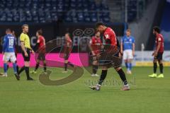 3. Liga - Hansa Rostock - FC Ingolstadt 04 - Spiel  ist aus, Unentschieden 1:1, Enttäuschung, hängende Köpfe, Justin Butler (31, FCI)