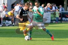 Landesliga - FC Gerolfing -SV Kirchanschöring - Kubicek Andrej #7 grün Gerolfing - Sturm Maximilian #31 schwarz Kirchanschöring -   Foto: Jürgen Meyer