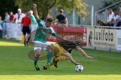 Landesliga - FC Gerolfing -SV Kirchanschöring -  Haunschild Philipp #21 grün Gerolfing - Straßer Alois #14 schwarz Kirchanschöring -  Foto: Jürgen Meyer