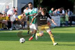 Landesliga - FC Gerolfing -SV Kirchanschöring - Kubicek Andrej #7 grün Gerolfing - Sturm Maximilian #31 schwarz Kirchanschöring -   Foto: Jürgen Meyer