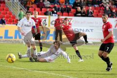 3.Liga - FC Ingolstadt 04 - SSV Jahn Regensburg - Andreas Buchner schiesst knapp vorbei, Marcel Hagmann am Boden rechts Ersin Demir schauen dem Ball nach