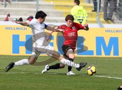 3.Liga - FC Ingolstadt 04 - SSV Jahn Regensburg - Andreas Buchner im Zweikampf mit Stefan Binder