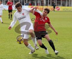 3.Liga - FC Ingolstadt 04 - SSV Jahn Regensburg - Andreas Buchner im Zweikampf mit Marcel Hagmann