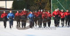 3.Liga - FC Ingolstadt 04 - Trainingsauftakt nach Winterpause - Warmlaufen mit dem neuen Co-Trainer Henning Bürger rechts, Stefan Schaidnagel links