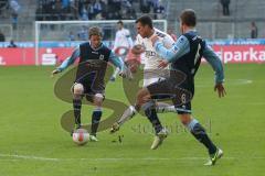 2. BL - FC Ingolstadt 04 - 1860 München 1:1 - mitte Christian Eigler (18) kämpft sich gegen rechts Dominik Stahl durch