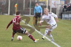 2. BL - Testspiel - 1.FC Nürnberg - FC Ingolstadt 04 2:1 - Leon Jessen umspielt Sinan Tekerci