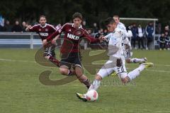 2. BL - Testspiel - 1.FC Nürnberg - FC Ingolstadt 04 2:1 - Alper Uludag (5) zieht ab links Noah Korcowski