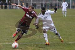 2. BL - Testspiel - 1.FC Nürnberg - FC Ingolstadt 04 2:1 - rechts Reagy Baah Ofosu (23) im Zweikampf mit Javier Pinola links