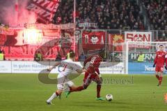 2. BL  - Saison 2013/2014 - FC Ingolstadt 04 - 1.FC Kaiserslautern - Danny da Costa (21) am Ball, hinten Pyrotechnik