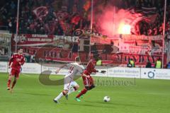 2. BL  - Saison 2013/2014 - FC Ingolstadt 04 - 1.FC Kaiserslautern - Danny da Costa (21) am Ball, hinten Pyrotechnik