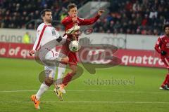 2. BL  - Saison 2013/2014 - FC Ingolstadt 04 - 1.FC Kaiserslautern - rechts Christoph Knasmüllner (7) fängt die Flanke und zieht ab, wird von links Marc Torrejon gestört